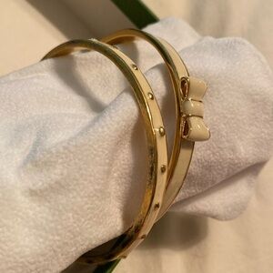Set of two ivory enamel Kate spade bangles